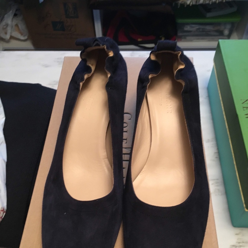 Navy suede pumps